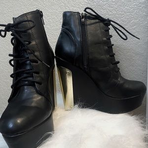 Call it spring Black and Gold High tops